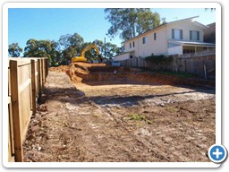 Stepped house pad excavation